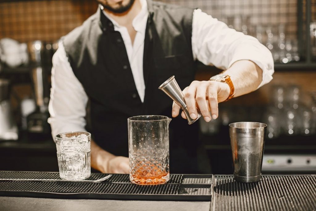 Image of Bartender Mixing Alcohol