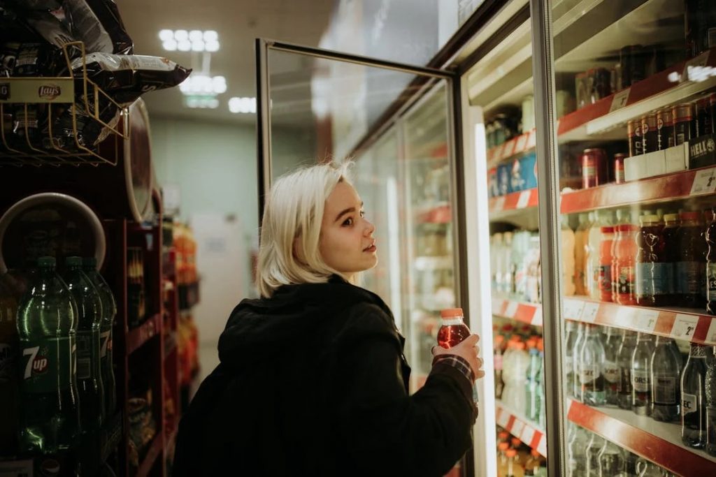 Image of Woman Buying a Drink