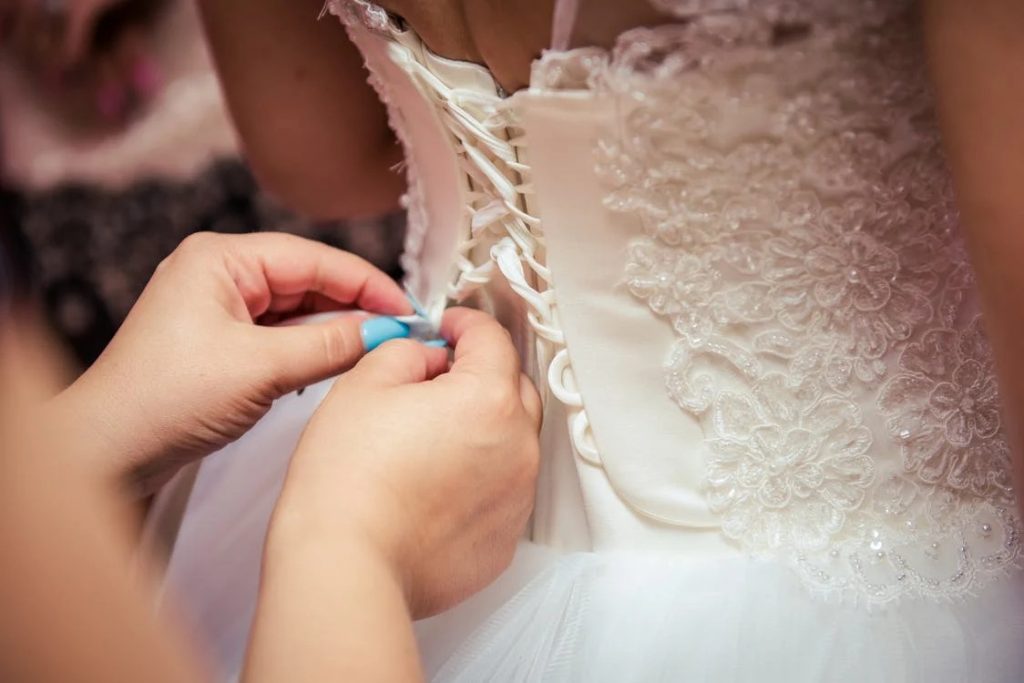 Image of Fixing the Wedding Gown