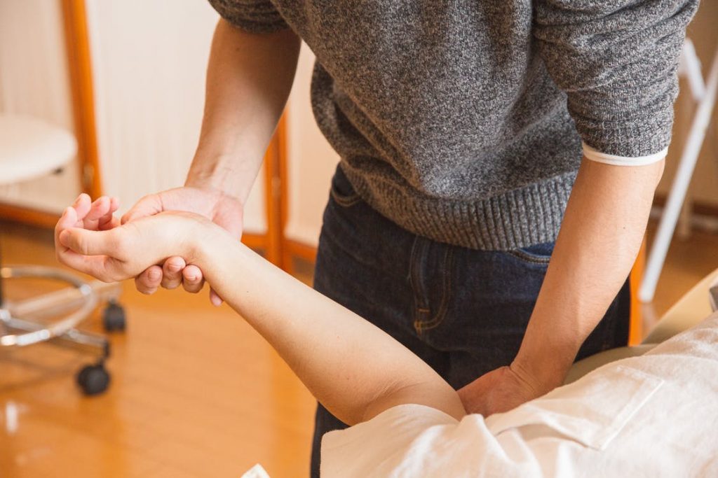Image of chiropractor massaging