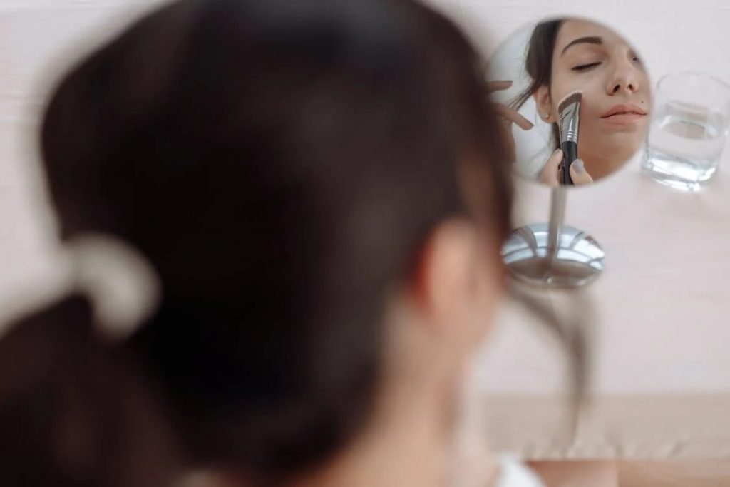 Image of A Woman Applying Makeup