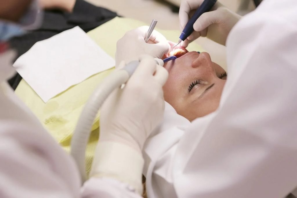 Image of checking Woman's Teeth
