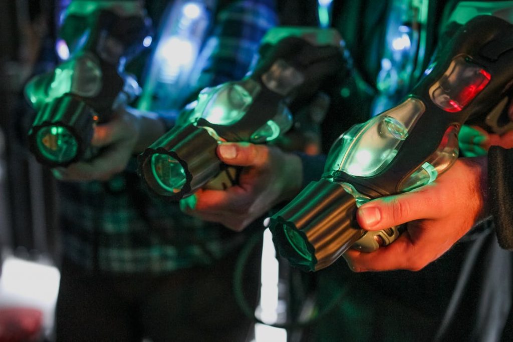 Image of Holding Laser Guns