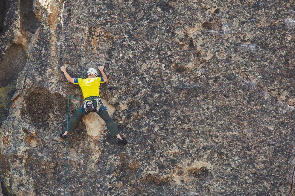 Image of Man Doing Outdoor Rock Climbing