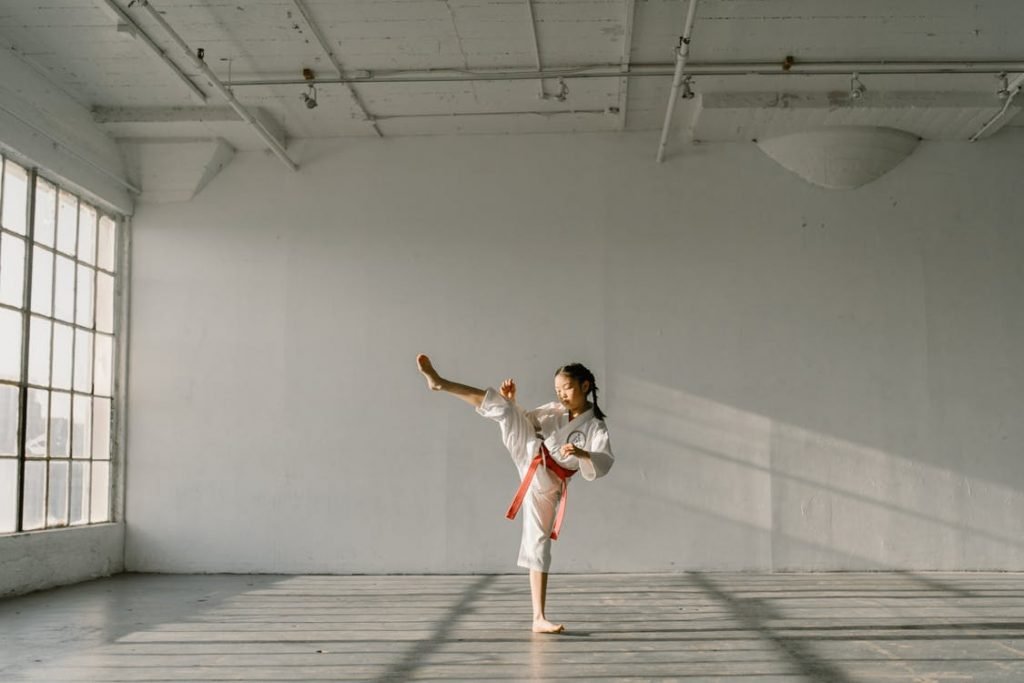 Image of A Girl Practicing Taekwondo