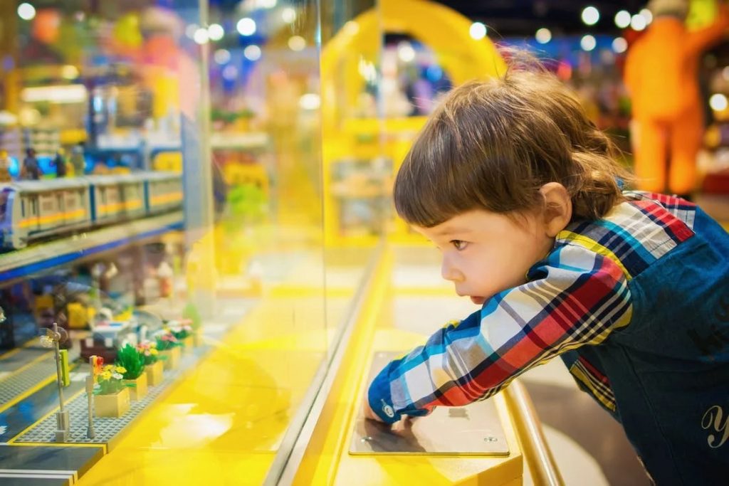 Image of Toddler in Front of Glass