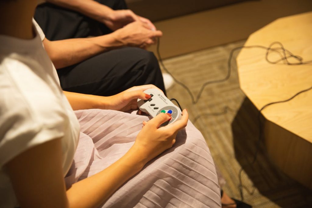 Image of couple playing video game